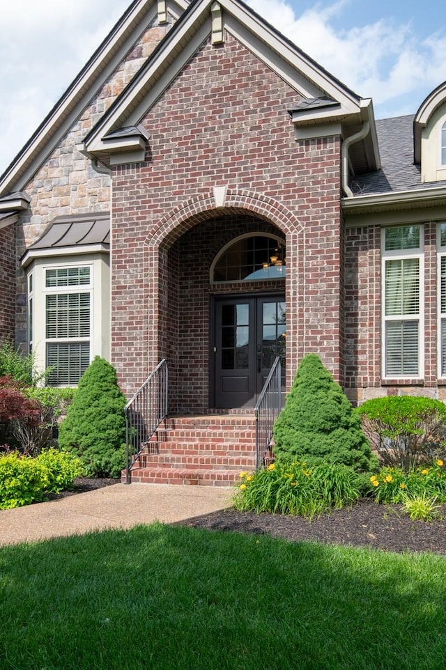 1237 Potter Ln, Gallatin, TN 37066 - view of exterior entry with french doors and brick siding