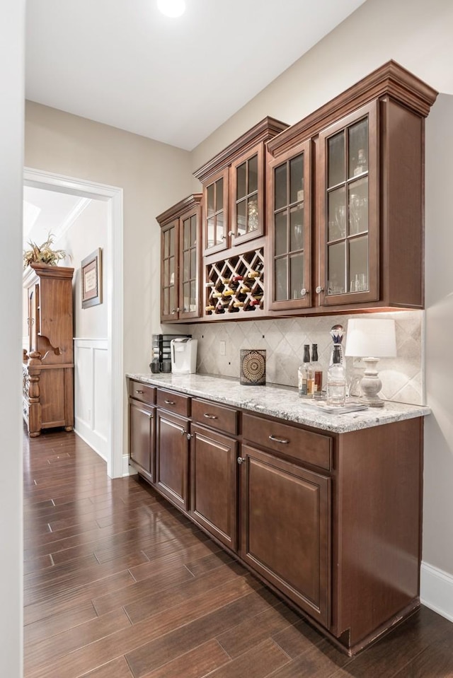 1237 Potter Ln, Gallatin, TN 37066 - indoor dry bar featuring backsplash, dark wood-type flooring, wainscoting, and a decorative wall