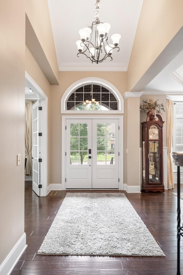 1237 Potter Ln, Gallatin, TN 37066 - foyer entrance with a chandelier, french doors, baseboards, ornamental molding, and dark wood-style floors