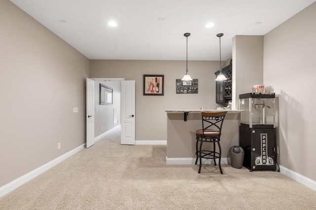 1237 Potter Ln, Gallatin, TN 37066 - indoor wet bar with light carpet, baseboards, decorative light fixtures, and recessed lighting