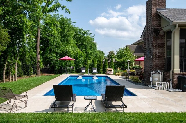 1237 Potter Ln, Gallatin, TN 37066 - outdoor pool featuring a patio and view of wooded area