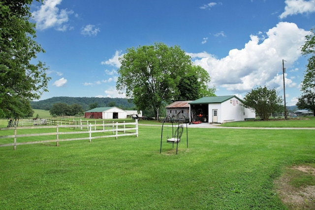 4957 Decatur Highway Highway, Ten Mile, TN 37880 - view of yard featuring an outbuilding, a detached garage, and a view of countryside
