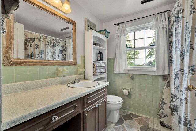 4957 Decatur Highway Highway, Ten Mile, TN 37880 - full bathroom with vanity, tile walls, toilet, and tile patterned flooring