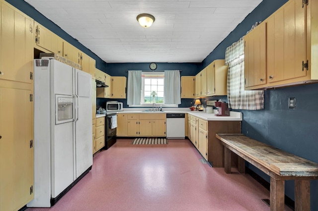 4957 Decatur Highway Highway, Ten Mile, TN 37880 - kitchen featuring white appliances, a sink, light countertops, under cabinet range hood, and light brown cabinets