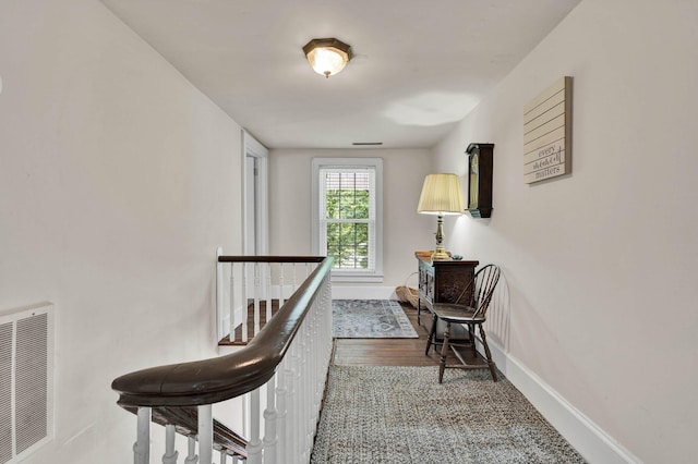 4957 Decatur Highway Highway, Ten Mile, TN 37880 - sitting room featuring an upstairs landing, baseboards, and wood finished floors
