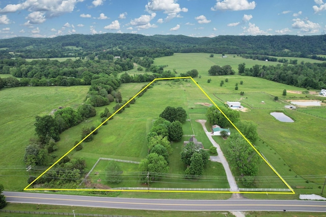 4957 Decatur Highway Highway, Ten Mile, TN 37880 - aerial view of sparsely populated area with property boundaries highlighted, agricultural land, and a mountainous background