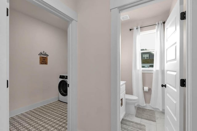 3608 Barbee Ct, Rockvale, TN 37153 - bathroom featuring washer / dryer, toilet, and baseboards