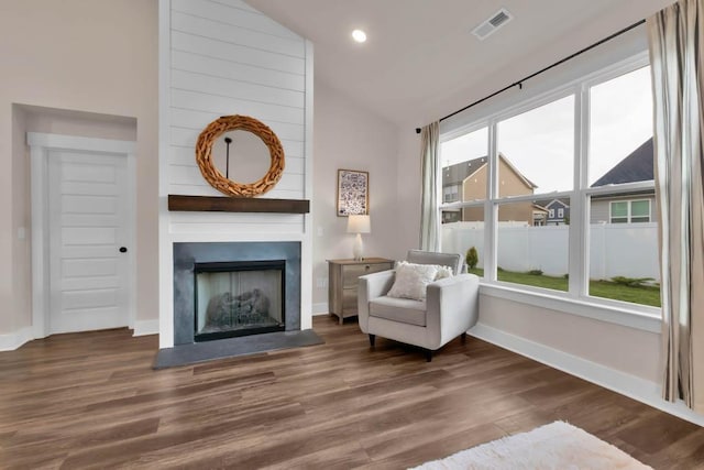 3608 Barbee Ct, Rockvale, TN 37153 - sitting room featuring vaulted ceiling, a fireplace, wood finished floors, baseboards, and recessed lighting