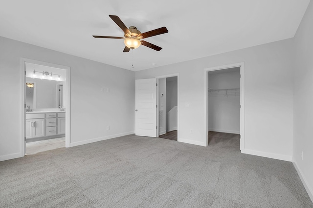 130 Beignet Aly, Hendersonville, TN 37075 - unfurnished bedroom featuring carpet flooring, baseboards, and a walk in closet
