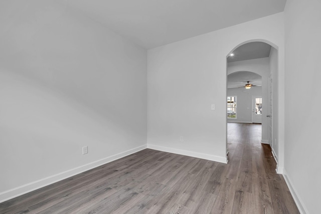 126 Beignet Aly, Hendersonville, TN 37075 - spare room with arched walkways, wood finished floors, a ceiling fan, and baseboards