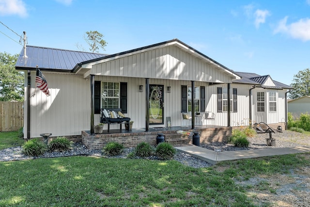 5024 Short Mountain Hwy, Smithville, TN 37166 - modern farmhouse with covered porch and metal roof