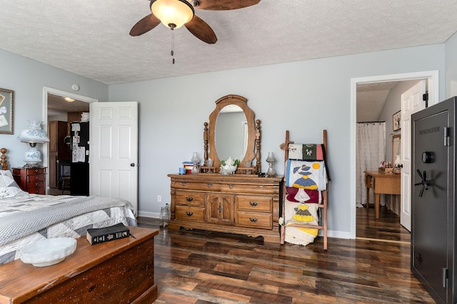 5024 Short Mountain Hwy, Smithville, TN 37166 - bedroom featuring dark wood-type flooring, a textured ceiling, baseboards, and ceiling fan