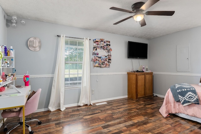 5024 Short Mountain Hwy, Smithville, TN 37166 - bedroom featuring wood finished floors, a textured ceiling, an office area, baseboards, and ceiling fan