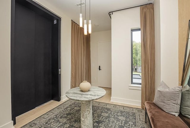 1030 17th Ave S Unit 201, Nashville, TN 37212 - bathroom featuring wood finished floors and baseboards