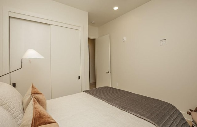 1030 17th Ave S Unit 201, Nashville, TN 37212 - bedroom featuring recessed lighting and a closet