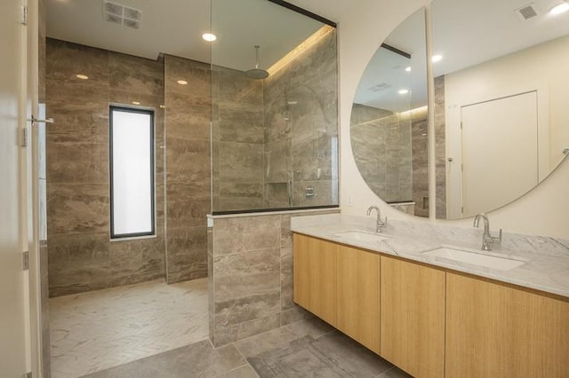 1030 17th Ave S Unit 201, Nashville, TN 37212 - full bath featuring double vanity, walk in shower, tile patterned floors, and recessed lighting