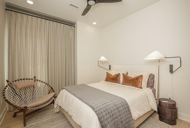 1030 17th Ave S Unit 201, Nashville, TN 37212 - bedroom featuring wood finished floors, baseboards, recessed lighting, and a ceiling fan