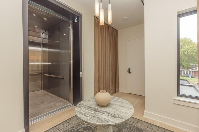 1030 17th Ave S Unit 201, Nashville, TN 37212 - elevator featuring wood finished floors