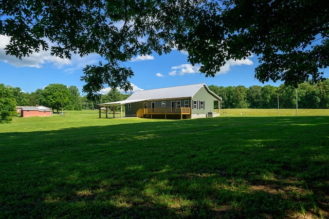 1474 Pea Ridge Rd, Manchester, TN 37355 - view of grassy yard with a deck