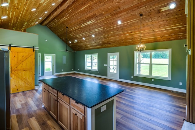 1474 Pea Ridge Rd, Manchester, TN 37355 - kitchen with dark countertops, wooden ceiling, baseboards, dark wood finished floors, and open floor plan