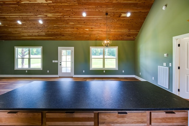 1474 Pea Ridge Rd, Manchester, TN 37355 - kitchen with wood ceiling, baseboards, wood finished floors, high vaulted ceiling, and pendant lighting