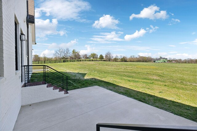 6656 Eudailey Covington Rd, College Grove, TN 37046 - view of yard featuring a view of rural / pastoral area and a patio