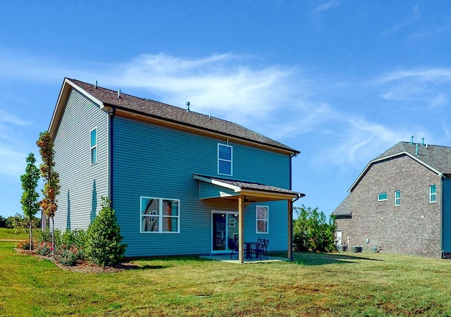 186 Millbrook Dr, Spring Hill, TN 37174 - back of property featuring a patio area and a yard