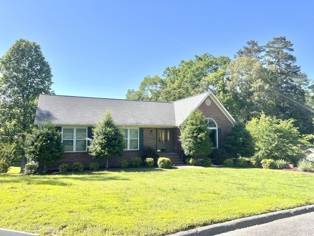 4015 Patton Edwards Dr, Chattanooga, TN 37412 - ranch-style home with brick siding and a front yard