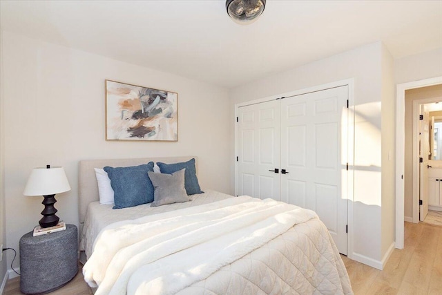 3670 Main St Unit 5, Jasper, TN 37347 - bedroom with light wood finished floors, a closet, and baseboards