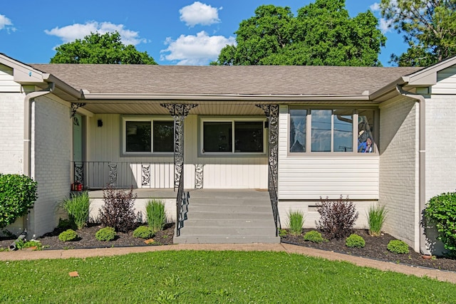 2000 Hickory Hill Ln, Hermitage, TN 37076 - single story home featuring a porch, a front lawn, brick siding, and a shingled roof