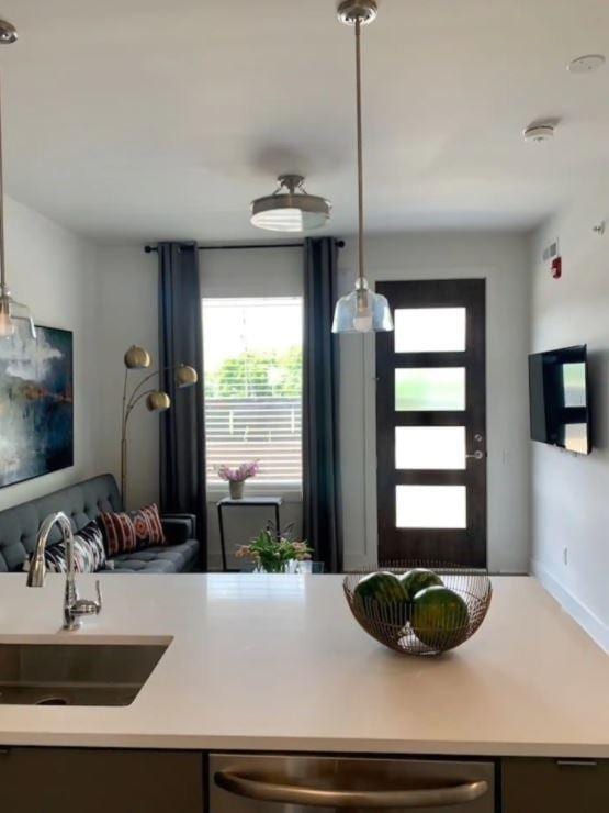 2521 Clifton Ave Unit 101, Nashville, TN 37209 - kitchen with a sink, light countertops, and open floor plan