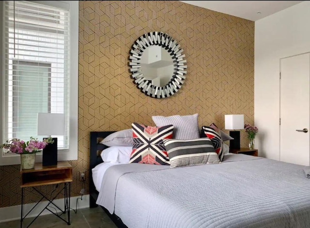 2521 Clifton Ave Unit 101, Nashville, TN 37209 - bedroom featuring an accent wall and wallpapered walls