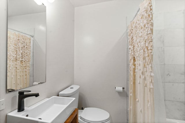 4303 Burrus St, Nashville, TN 37216 - bathroom featuring toilet, vanity, and shower / bathtub combination with curtain