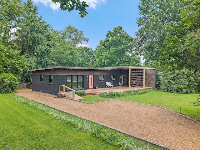 4303 Burrus St, Nashville, TN 37216 - back of property featuring a yard