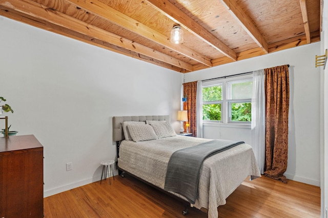 4303 Burrus St, Nashville, TN 37216 - bedroom with beam ceiling, wood finished floors, and baseboards