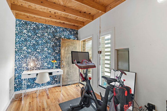 4303 Burrus St, Nashville, TN 37216 - workout room with wallpapered walls, wood finished floors, an accent wall, wooden ceiling, and baseboards