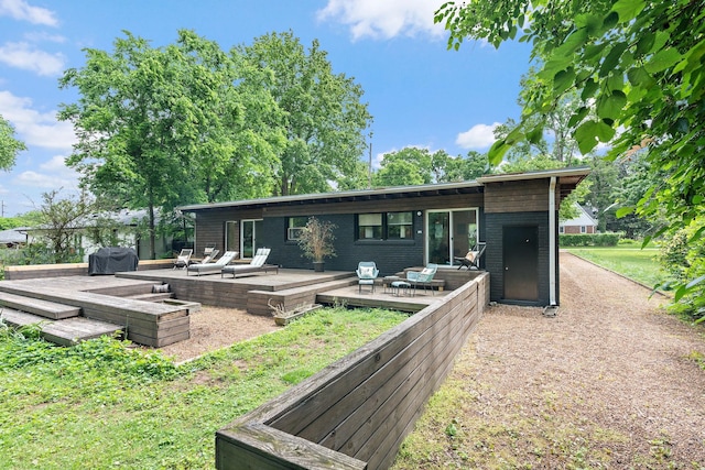 4303 Burrus St, Nashville, TN 37216 - back of house with an outdoor hangout area and a deck