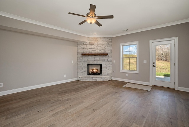 5405 Manners Rd, Lebanon, TN 37087 - unfurnished living room with ceiling fan, crown molding, wood finished floors, a fireplace, and baseboards