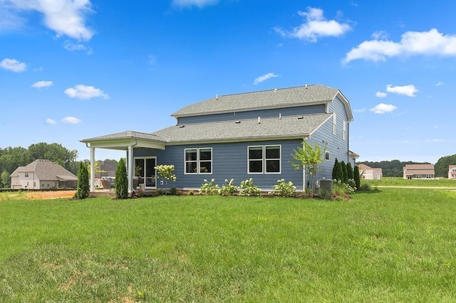 2506 Beverly Gail Rd, Pleasant View, TN 37146 - rear view of property featuring a yard, roof with shingles, and central AC unit