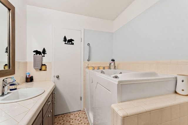 501 Jolley Rd, Doyle, TN 38559 - bathroom featuring vanity, a bath, and wainscoting