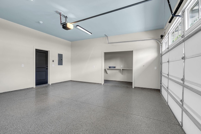 1004 Noble Loop Unit 49, Nashville, TN 37211 - garage featuring electric panel and a garage door opener