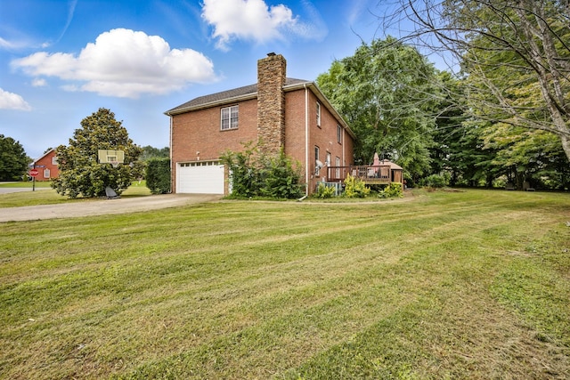3198 Gray Hawk Ct, Clarksville, TN 37043 - view of property exterior with driveway, a garage, a chimney, brick siding, and a yard