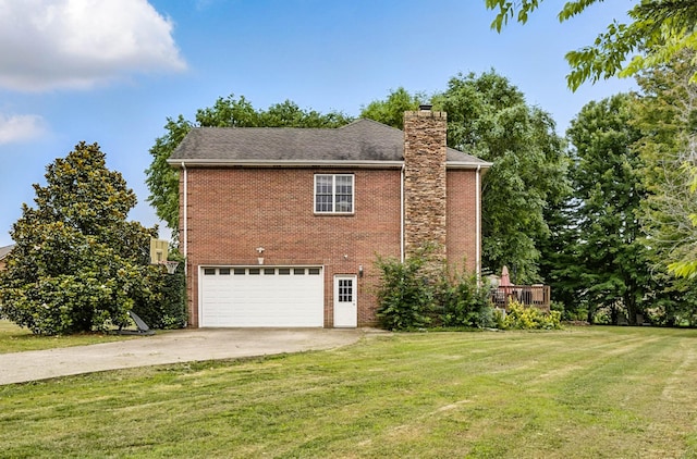 3198 Gray Hawk Ct, Clarksville, TN 37043 - view of property exterior with driveway, a chimney, a yard, an attached garage, and brick siding