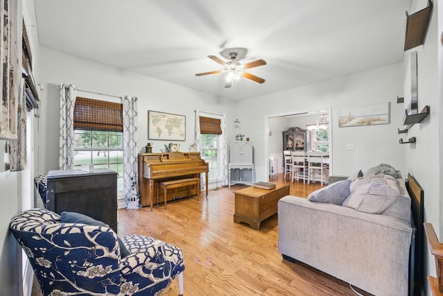 3198 Gray Hawk Ct, Clarksville, TN 37043 - living area featuring ceiling fan, light wood finished floors, and healthy amount of natural light