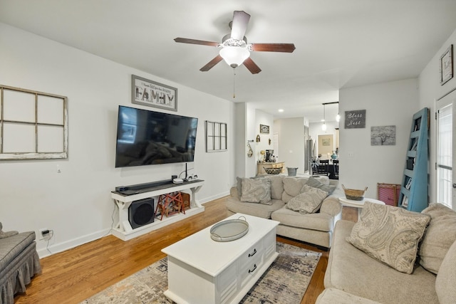 3198 Gray Hawk Ct, Clarksville, TN 37043 - living room with a ceiling fan and light wood-style flooring