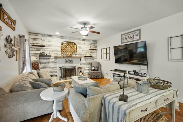 3198 Gray Hawk Ct, Clarksville, TN 37043 - living area featuring wood finished floors, a ceiling fan, a fireplace, and recessed lighting
