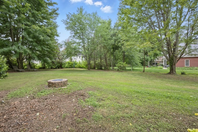 3198 Gray Hawk Ct, Clarksville, TN 37043 - view of grassy yard with an outdoor fire pit