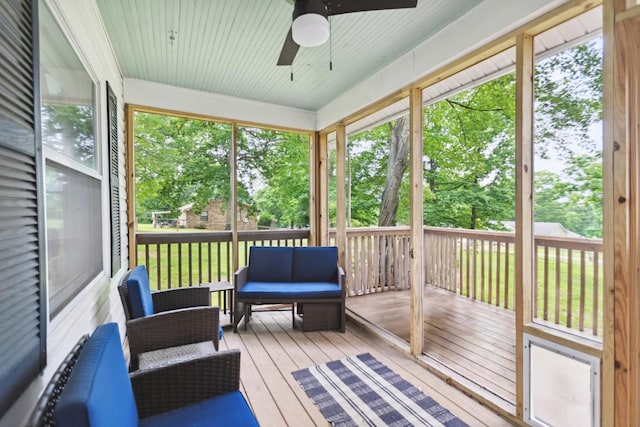 1602 Pleasant Grove Rd, Westmoreland, TN 37186 - sunroom / solarium featuring an outdoor hangout area, a ceiling fan, and view of scattered trees