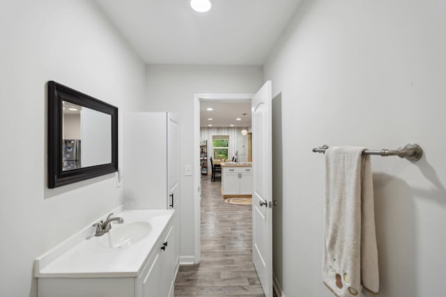 1602 Pleasant Grove Rd, Westmoreland, TN 37186 - bathroom featuring wood finished floors, vanity, and recessed lighting