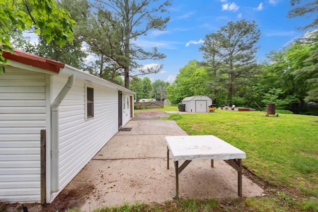 1602 Pleasant Grove Rd, Westmoreland, TN 37186 - view of grassy yard with a patio area